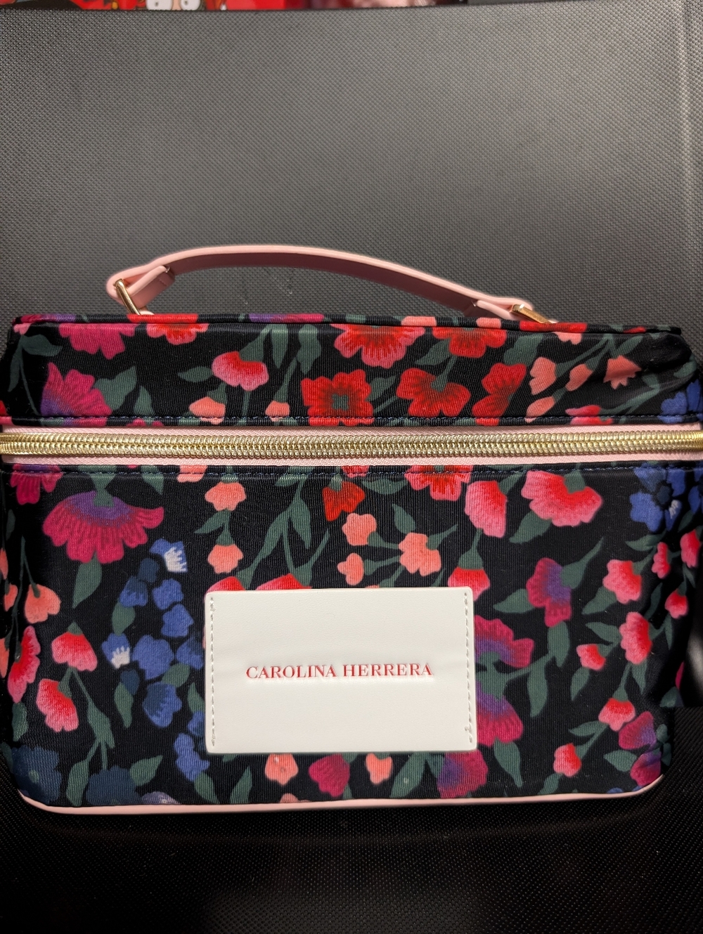 Brand New Carolina Herrera Black Floral Cosmetic Case with Pink Handle